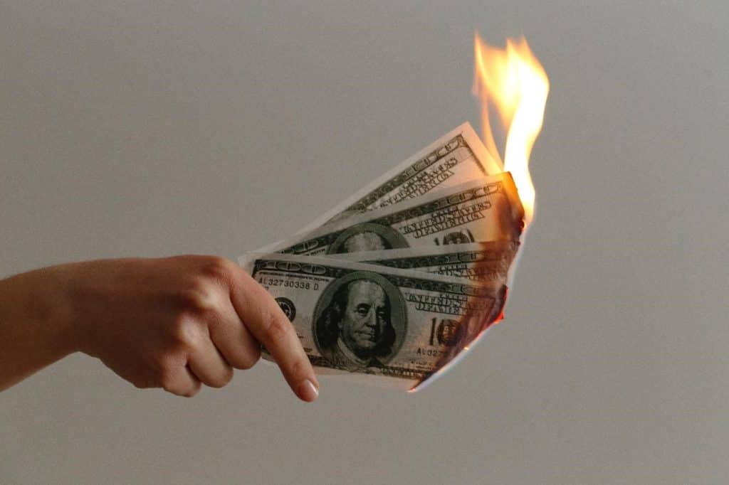 Person holding dollars